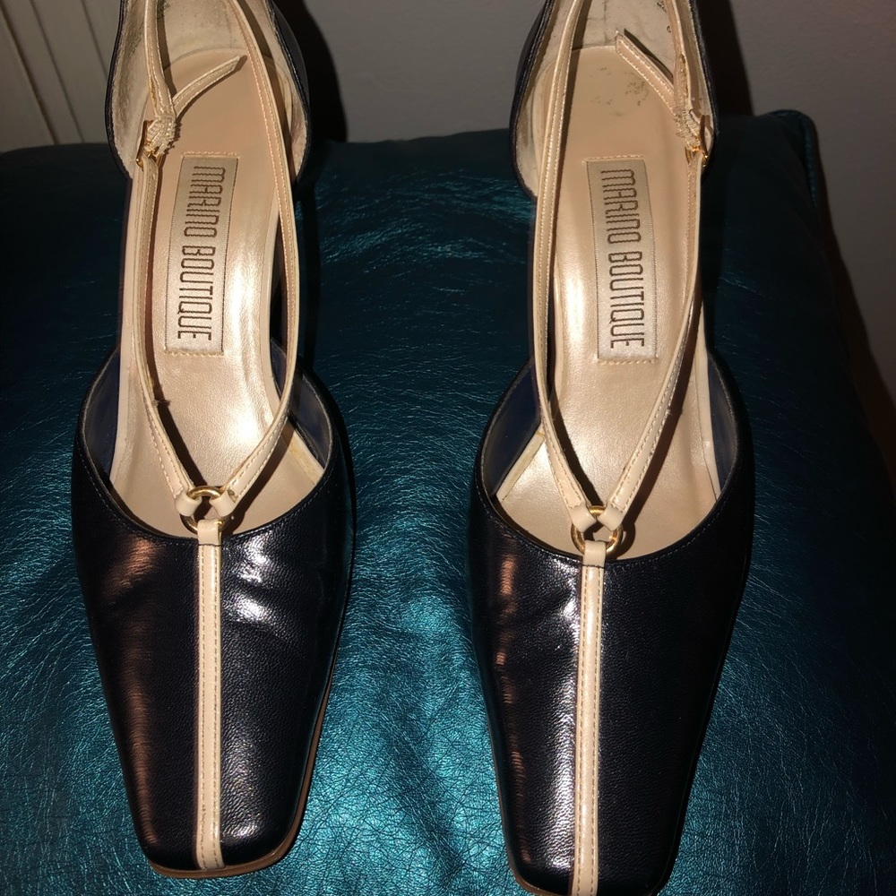 Navy and cream wedge leather shoes.